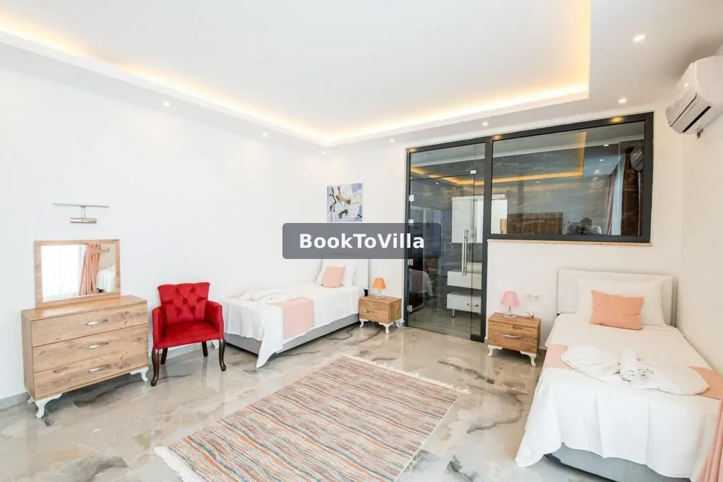 Kalkan Akbel'de deniz manzaralı, jakuzili ve korunaklı havuzlu Villa Twins 1